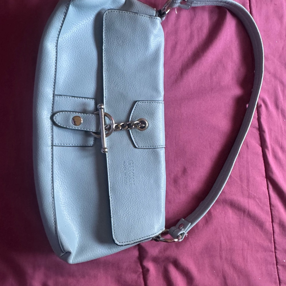 Blue Denim Shoulder Bag with Adjustable Strap and Toggle Closure